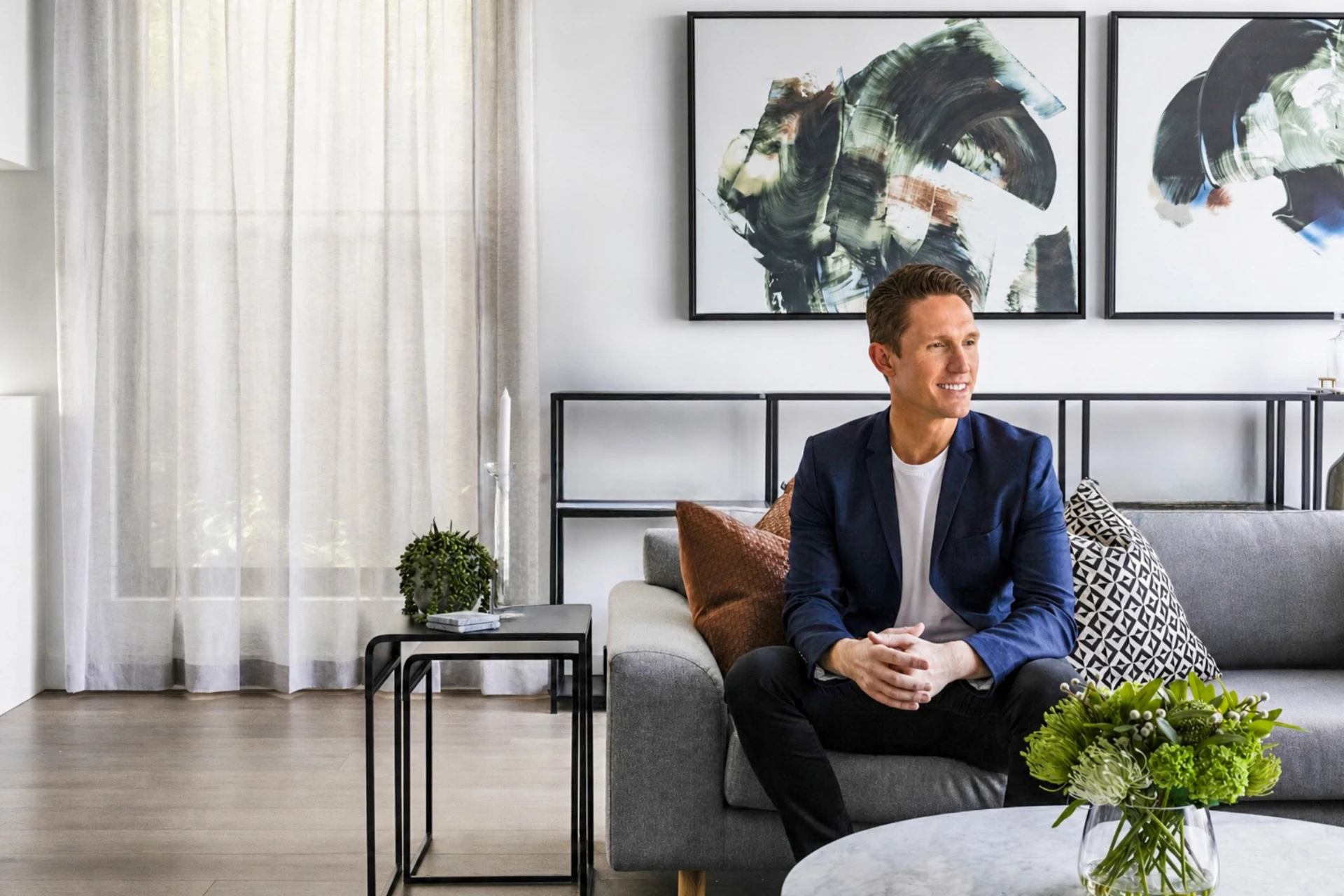 Mike Wilen seated in a modern living room