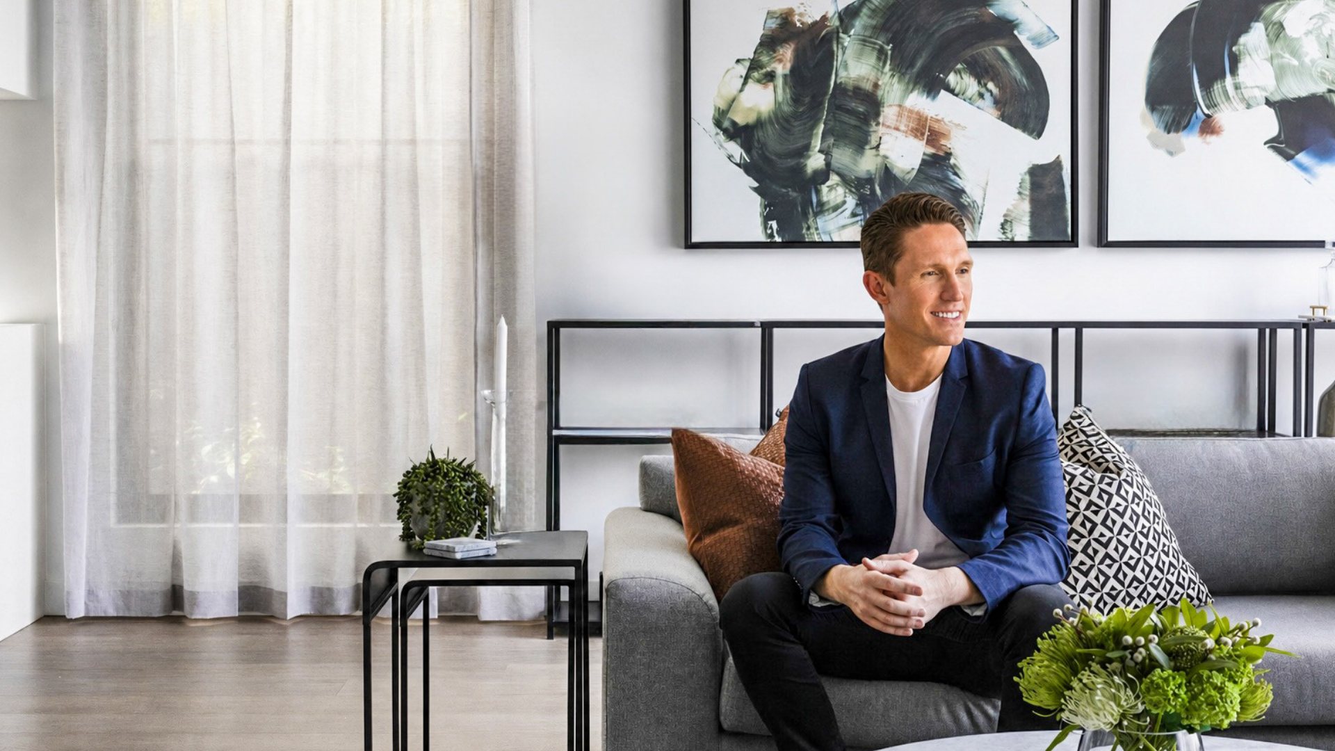 Mike Wilen seated in a modern living room